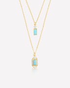 18K yellow gold-plated two-layered necklace featuring an emerald-shaped turquoise stone with pure zircon accents
